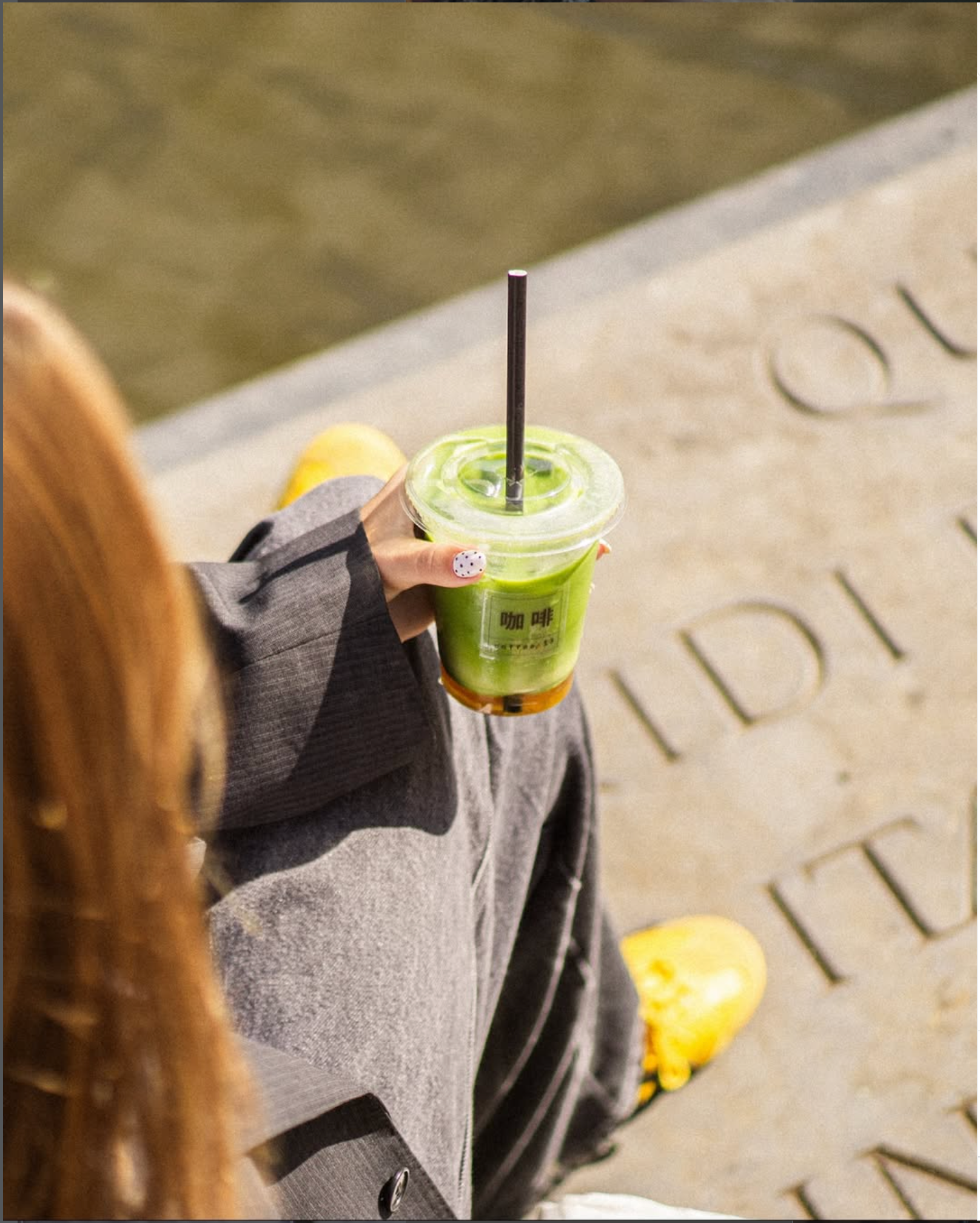 Iced matcha in hand on a sunny walk